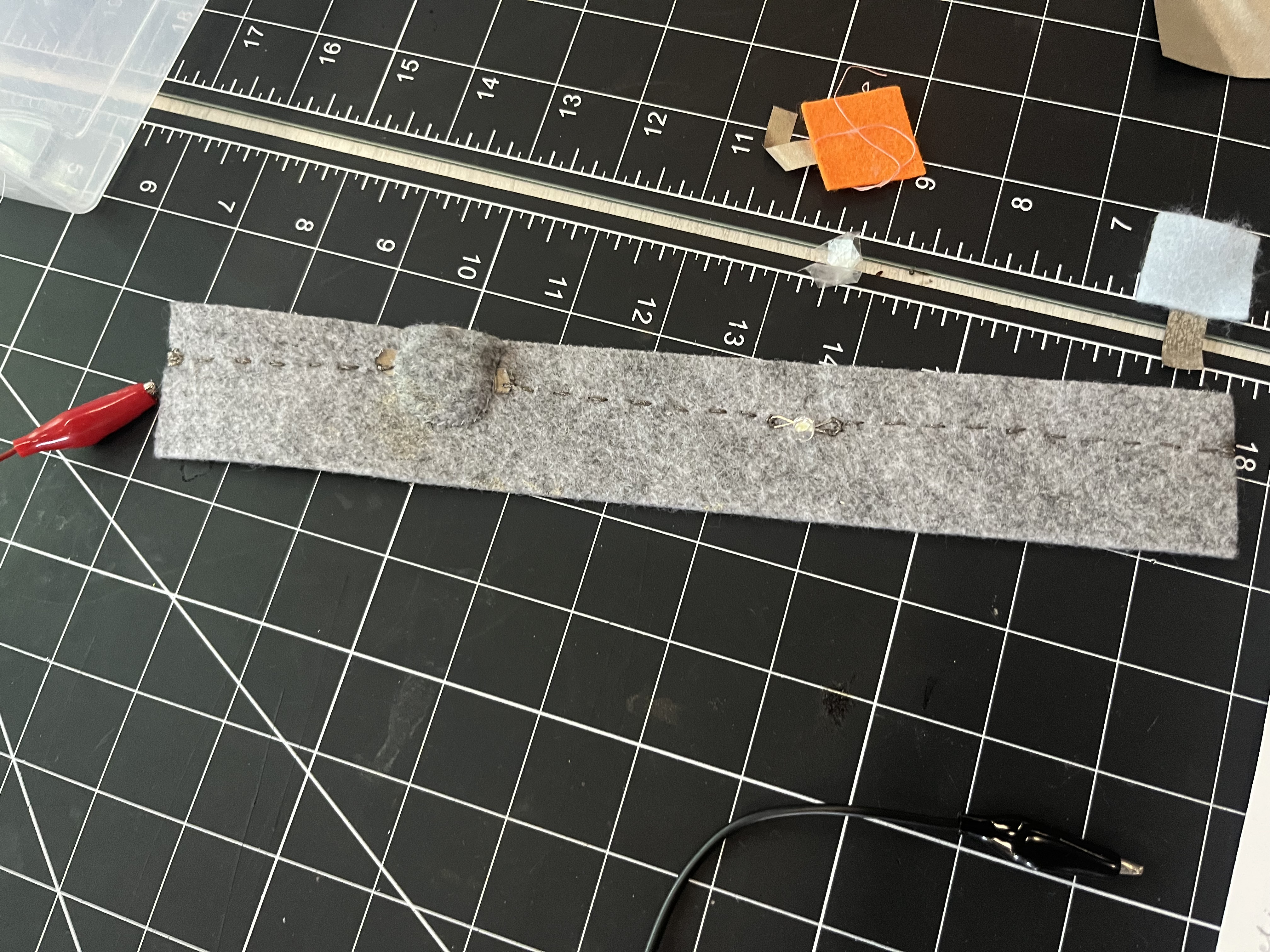 Constructing a circuit relying entirely on conductive thread connections.