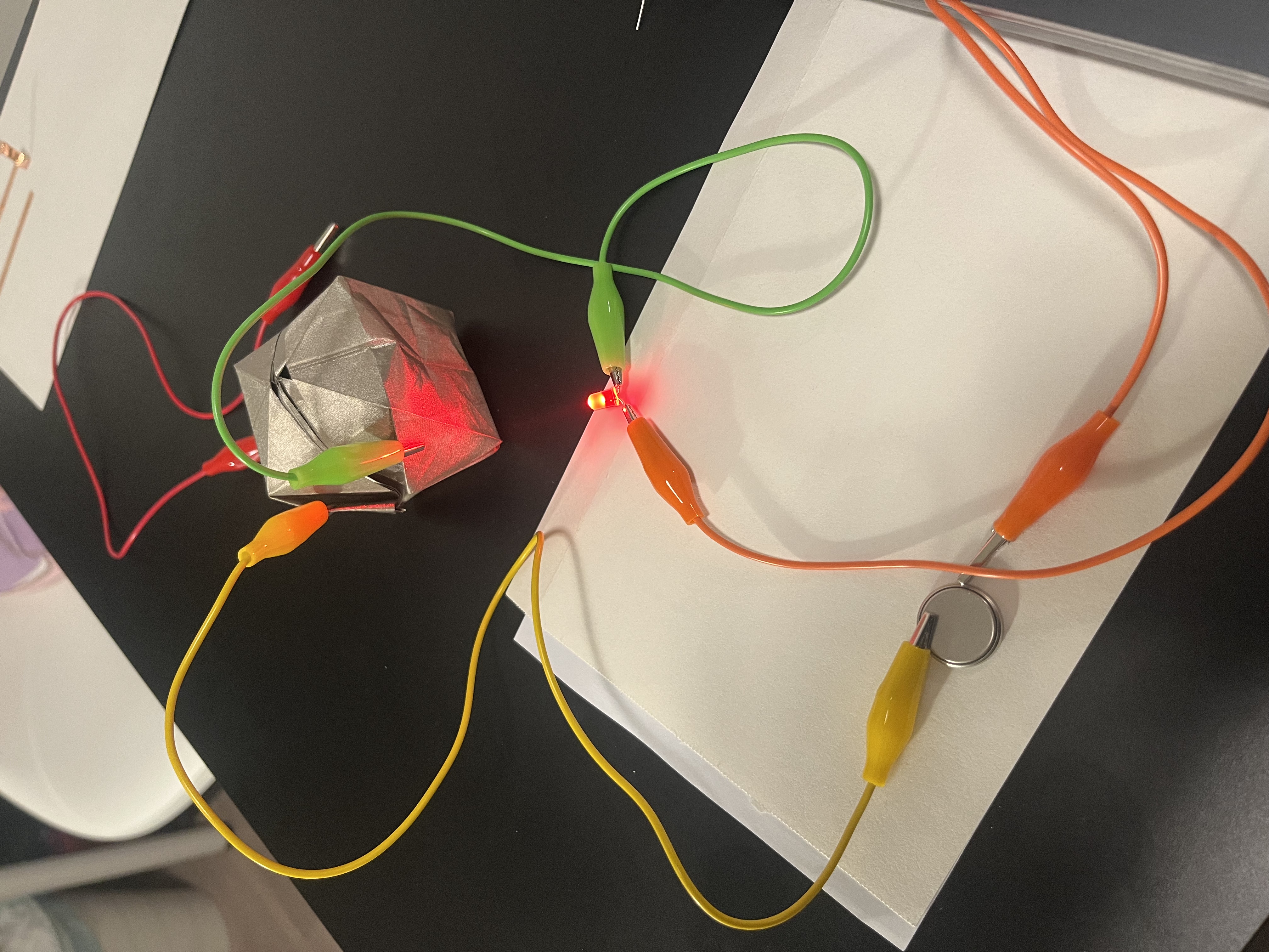 Testing conductive fabric as a primary conductor and folding it into different structural forms.