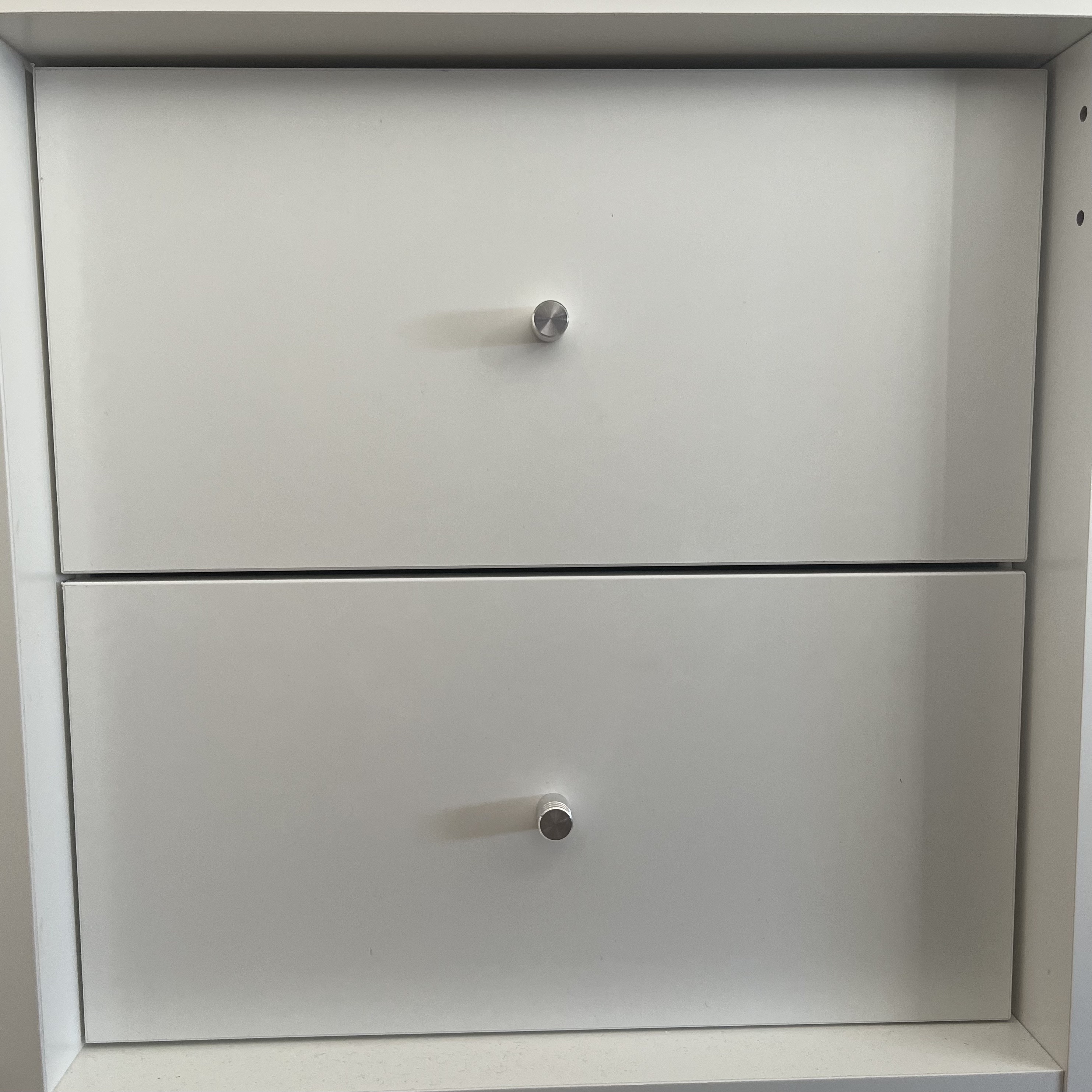 Investigating a drawer-based switching system through physical observation.