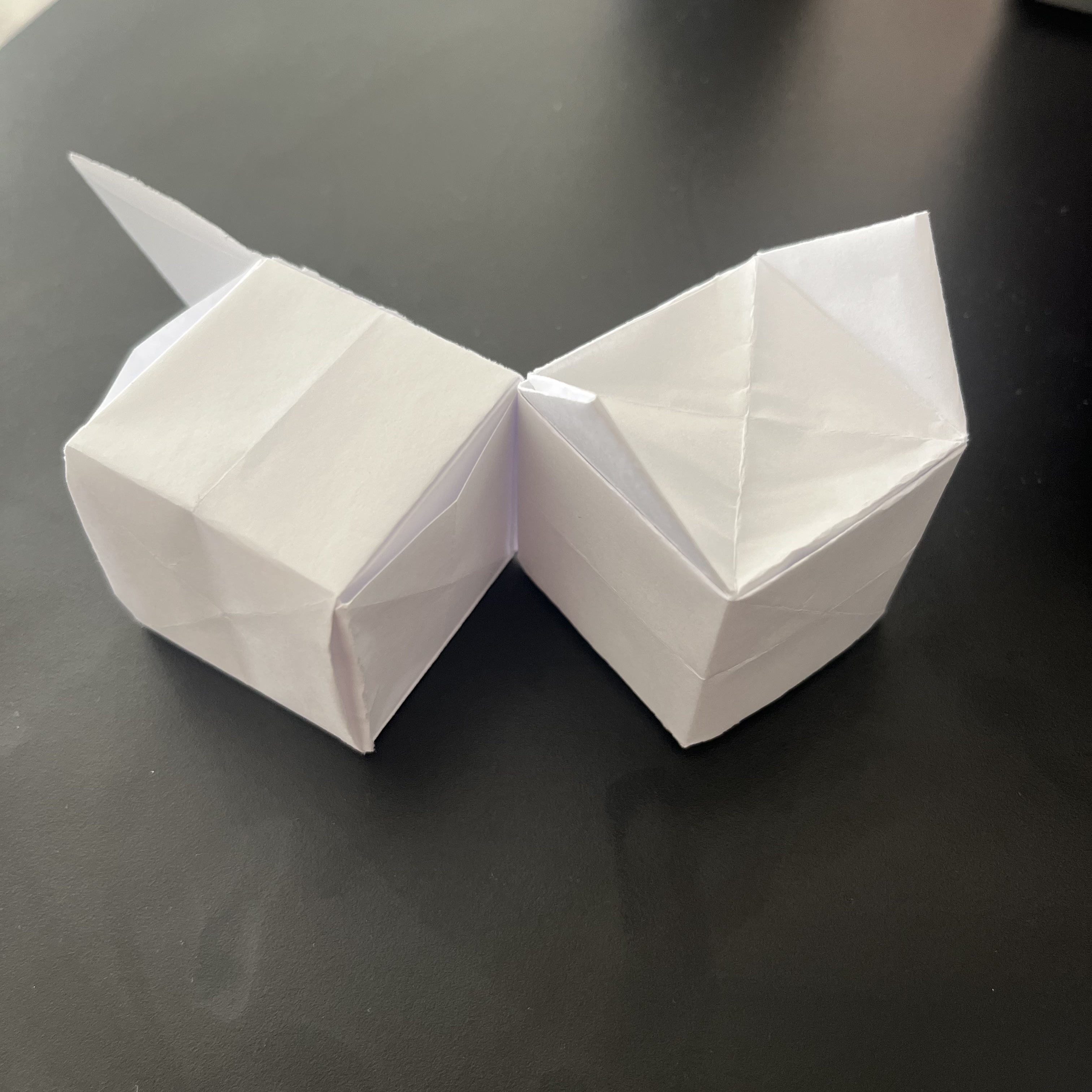 Testing a simple paper-based switch to explore contact-driven activation.